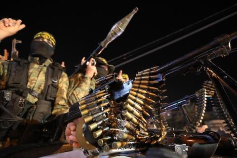 عناصر سرايا القدس الجناح العسكري لحركة الجهاد الإسلامي ينظمون مسيرا عسكريا في خانيونس