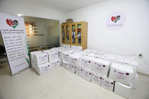بنك فلسطين يوزع طروداً غذائية على العائلات المتعففة خلال الشهر الفضيل.jpg