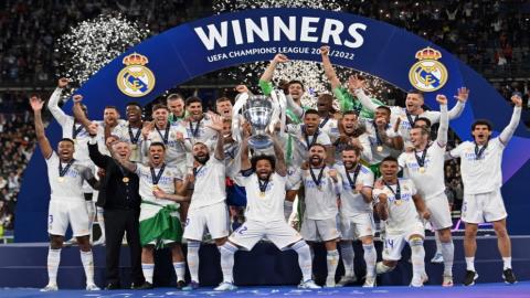 لاعبو ريال مدريد يحتفلون. 28 مايو 2022.. (أ ف ب)