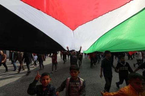 انصار الجبهة الشعبية لتحرير فلسطين يشاركون في مسيرة بمناسبة الذكرى 54 لتأسيسها في مدينة غ
