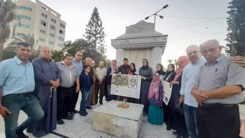 التجمع الفلسطيني للوطن و الشتات يضئ الشموع بذكرى صبرا و شاتيلا أمام الجندي المجهول بمدينة غزة.jpg