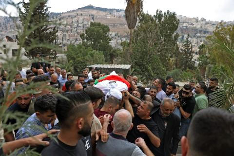 من تشييع ضحية الأحداث المؤسفة في نابلس فراس يعيش .. تصوير (الفرنسية) 1.jpg