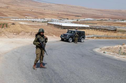من مكان عملية إطلاق النار في غور الأردن .. تصوير .. (أ ف ب ).jpg