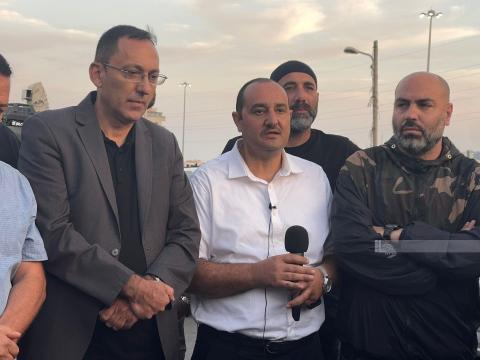 مؤتمر صحفي للقوى الوطنية والاسلامية أمام حاجز شعفاط رفضا لإغلاق المخيم.jpg