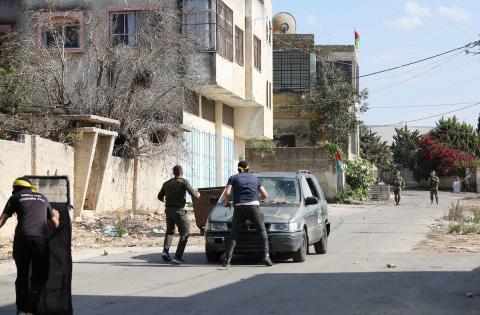 مواجهات بين المتظاهرين الفلسطينيين وجيش الاحتلال عقب المسيرة الأسبوعية المناهضة للاستيطان في كفر قدوم 6.jpg