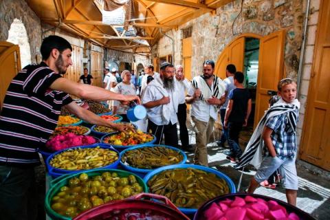 مستوطنون في الخليل (أرشيفية - Getty Images).jpg