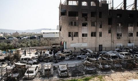 حوارة غداة اعتداء المستوطنين الإرهابي ( Getty Images).jpg