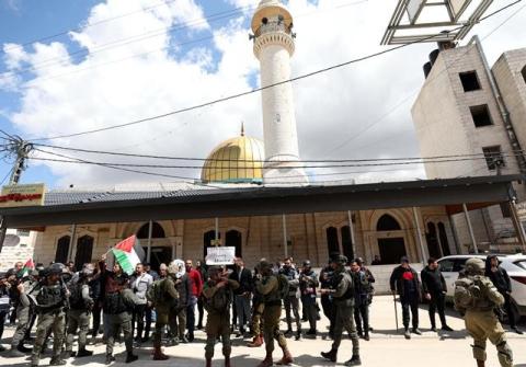 تقرير الاستيطان يتوسع والفلسطينيون يحيون يوم الارض الخالد في ظل حصار قاس لمدنهم وقراهم