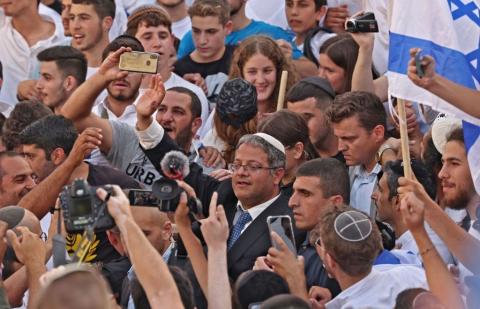 بن عفير يشارك في  مسيرة الأعلام  العام الماضي (Getty Images).jpg