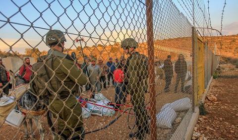 عمال فلسطينيون.jpg