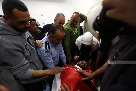 وداع الشهيد الشاب عودة عاطف عواودة في مجمع فلسطين الطبي برام الله (تصوير..حمزة شلش-وفا).jfif