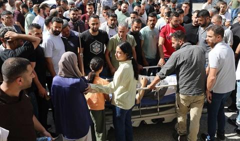 جانب من وداع جثمان أحد الشهداء في بلدة تل (Getty Images).jpg