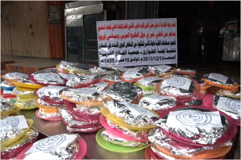النجدة الاجتماعية توزع طرود غذائية على الأسر المحتاجة في قطاع غزة