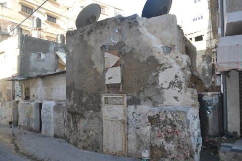 انهيار منزل أثري بحي الدرج نتيجة المنخفض الجوي