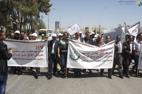 اتحاد نقابات عمال فلسطين يحيي الأول من أيار بمسيرة ومهرجان حاشدين