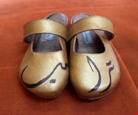 فيديو فلسطيني يبيع أحذية بإسم ترامب