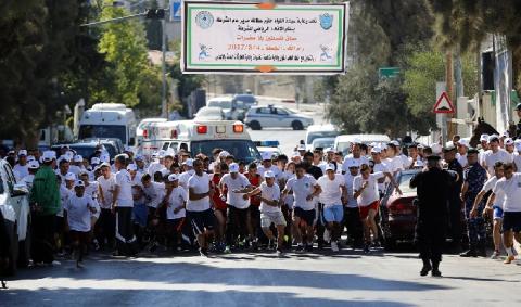 الشرطة تنظم ماراثونا رياضيا بعنوان “سباق فلسطين بلا مخدرات“