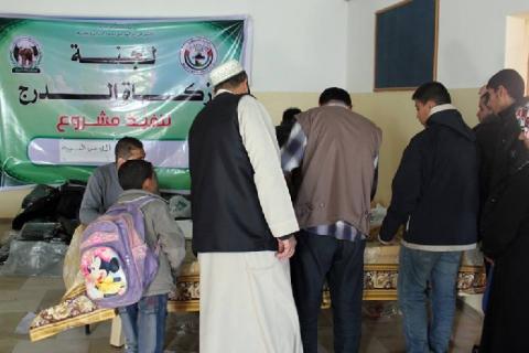 زكاة الدرج تُوزع 400 "جاكيت شتوي" على الأسر الفقيرة