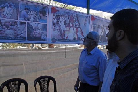 صور .. معرض صور يوثق "مجزرة رفح"