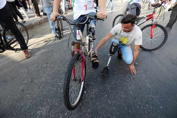 ذوي الإعاقة يشاركون في سباق للدراجات الهوائية في مدينة غزة 1