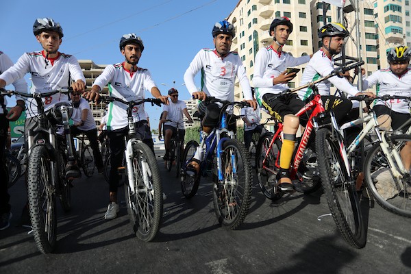 ذوي الإعاقة يشاركون في سباق للدراجات الهوائية في مدينة غزة 22