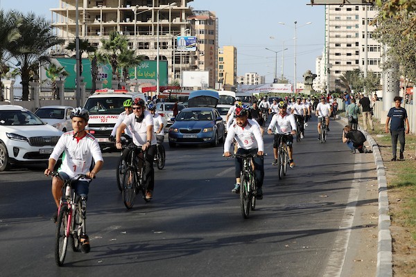 ذوي الإعاقة يشاركون في سباق للدراجات الهوائية في مدينة غزة 6