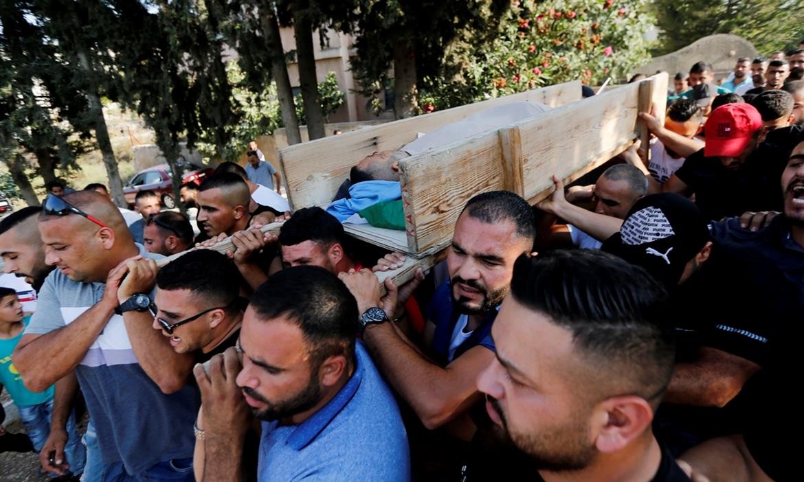 تشييع جثمان الشهيد رائد جاد الله إلى مثواه الأخير9