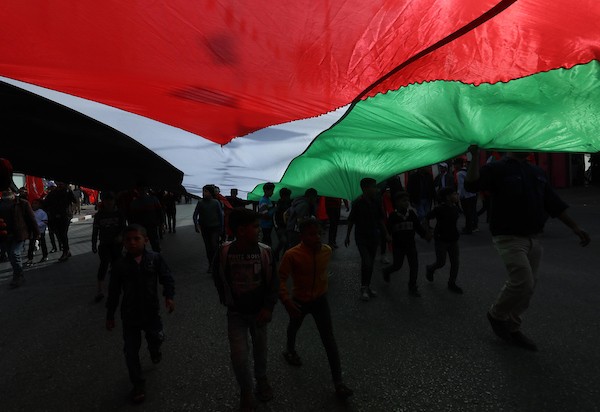  أنصار الجبهة الشعبية لتحرير فلسطين يشاركون في مسيرة بمناسبة الذكرى 54 لتأسيسها في مدينة غزة