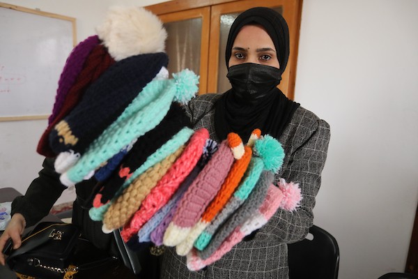 مبادرة فلسطينية لتوزيع الملابس الصوفية على الفقراء في فصل الشتاء 3