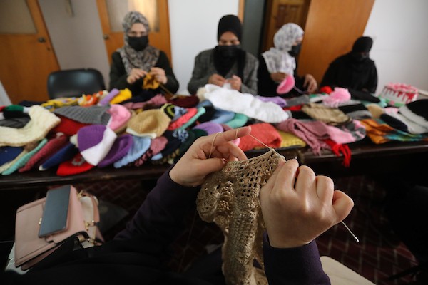 مبادرة فلسطينية لتوزيع الملابس الصوفية على الفقراء في فصل الشتاء 2