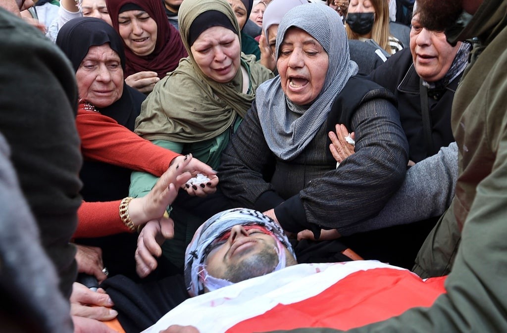 جماهير غفيرة تشيع جثماني الشـهيدين سند أبو عطية ويزيد السعدي، اللذين ارتقيا خلال اشتباك مع قوات الاحتلال بعد اقتحامها مخيم جنين 7.jpg