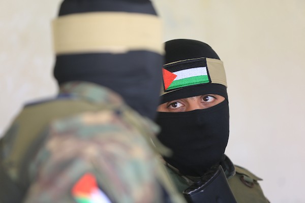 فلسطينيون أنصار حركة حماس يحضرون المؤتمر الوطني في الذكرى السنوية الأولى لمعركة سيف القدس في مدينة غزة