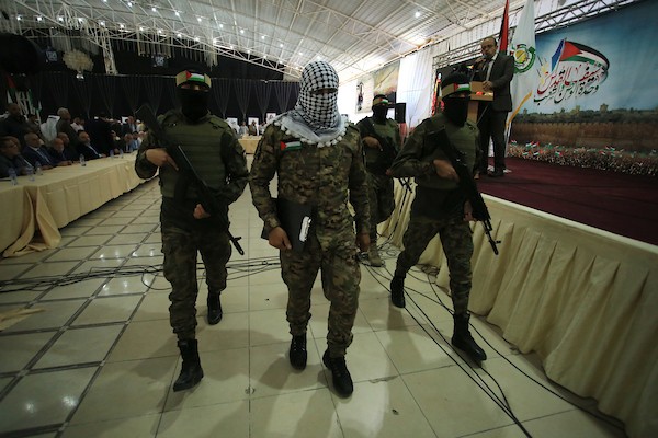 فلسطينيون أنصار حركة حماس يحضرون المؤتمر الوطني في الذكرى السنوية الأولى لمعركة سيف القدس في مدينة غزة