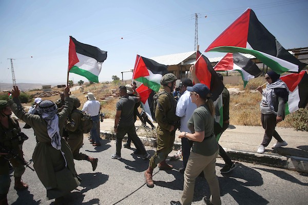 مواجهات بين جنود إسرائيليون متظاهرون فلسطينيون خلال مظاهرة ضد المستوطنات الإسرائيلية في الأغوار الشمالية قرب طوباس في الضفة الغربية 12.jpg