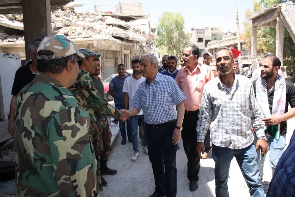 وفد قيادي من الشعبية يتقدمه نائب الأمين العام يزور مخيم اليرموك  6.jpg