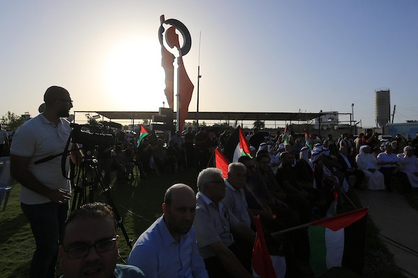 فلسطينيون يشاركون في مظاهرة تضامنية مع المسجد الأقصى بالقرب من الحدود شرق مدينة غزة 8.jpg