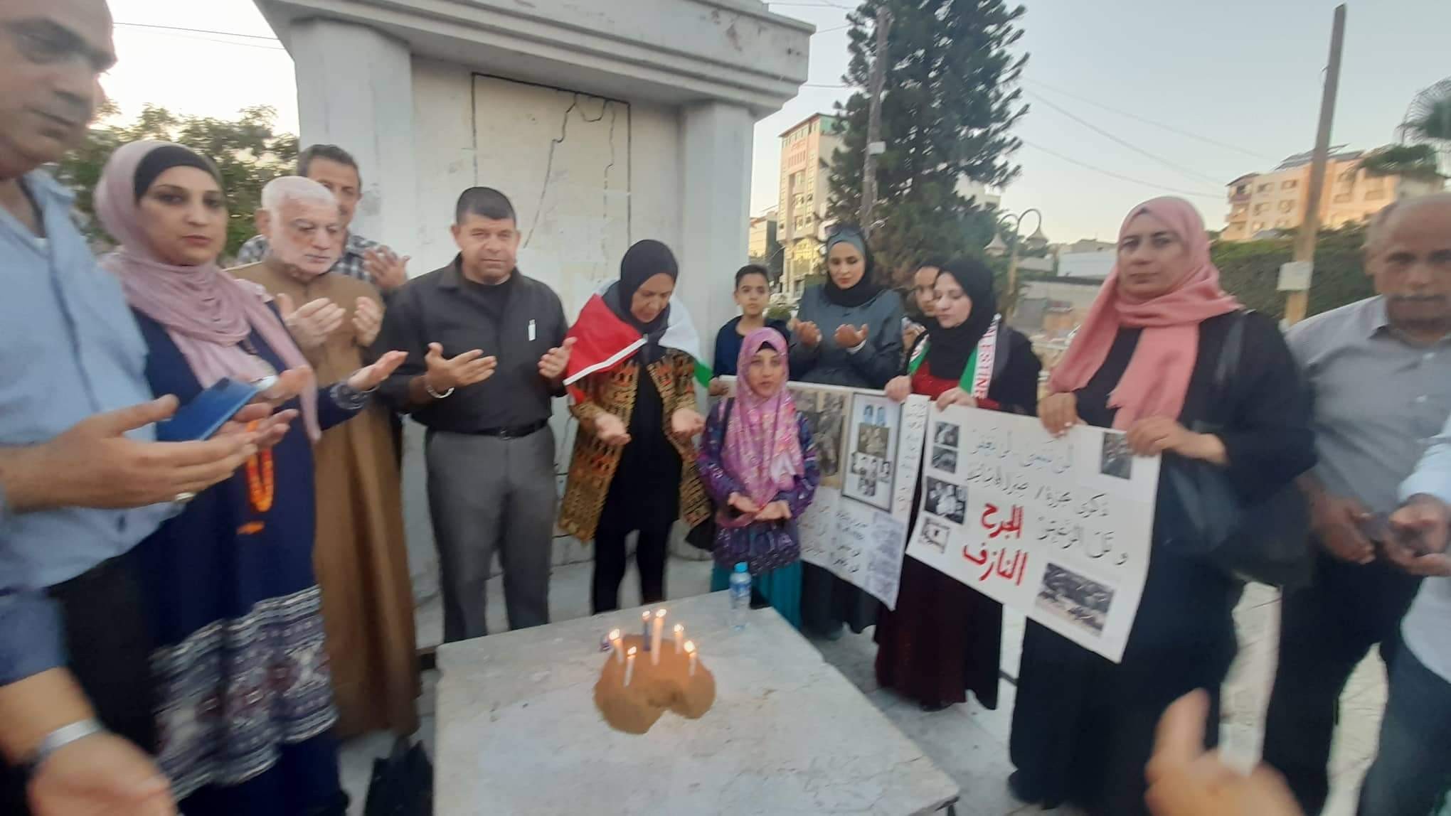 التجمع الفلسطيني للوطن و الشتات يضئ الشموع بذكرى صبرا و شاتيلا أمام الجندي المجهول بمدينة غزة   5.jpg