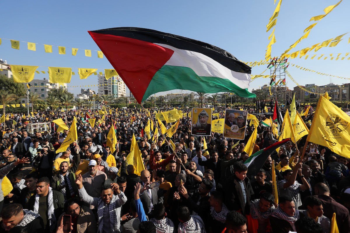 أنصار حركة فتح يشاركون في مهرجان مركزي في الذكرى الـ 18 لاستشهاد الرئيس الفلسطيني الراحل ياسر عرفات في غزة 43.jpg