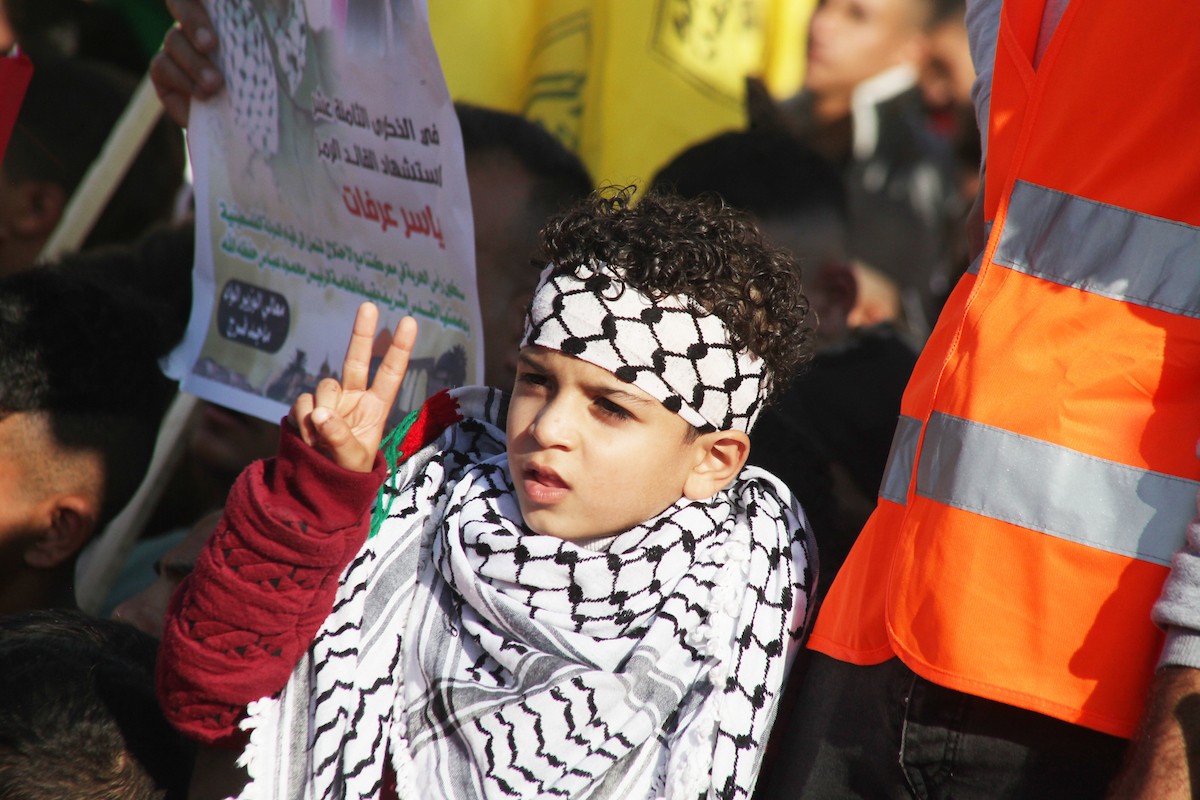 أنصار حركة فتح يشاركون في مهرجان مركزي في الذكرى الـ 18 لاستشهاد الرئيس الفلسطيني الراحل ياسر عرفات في غزة 1.jpg