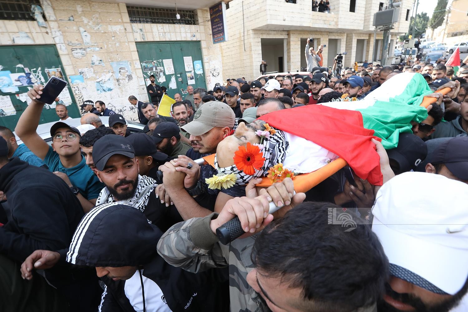 تشييع جثمان الشهيد داوود ريان (42 عاما) الى مثواه الاخير في بيت دقو شمال غرب القدس 5.jpg