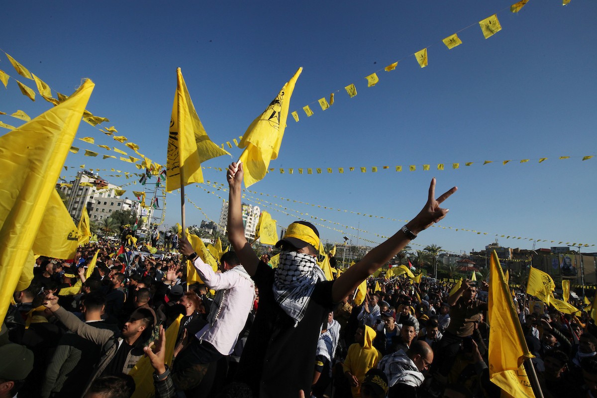 أنصار حركة فتح يشاركون في مهرجان مركزي في الذكرى الـ 18 لاستشهاد الرئيس الفلسطيني الراحل ياسر عرفات في غزة 11(1).jpg