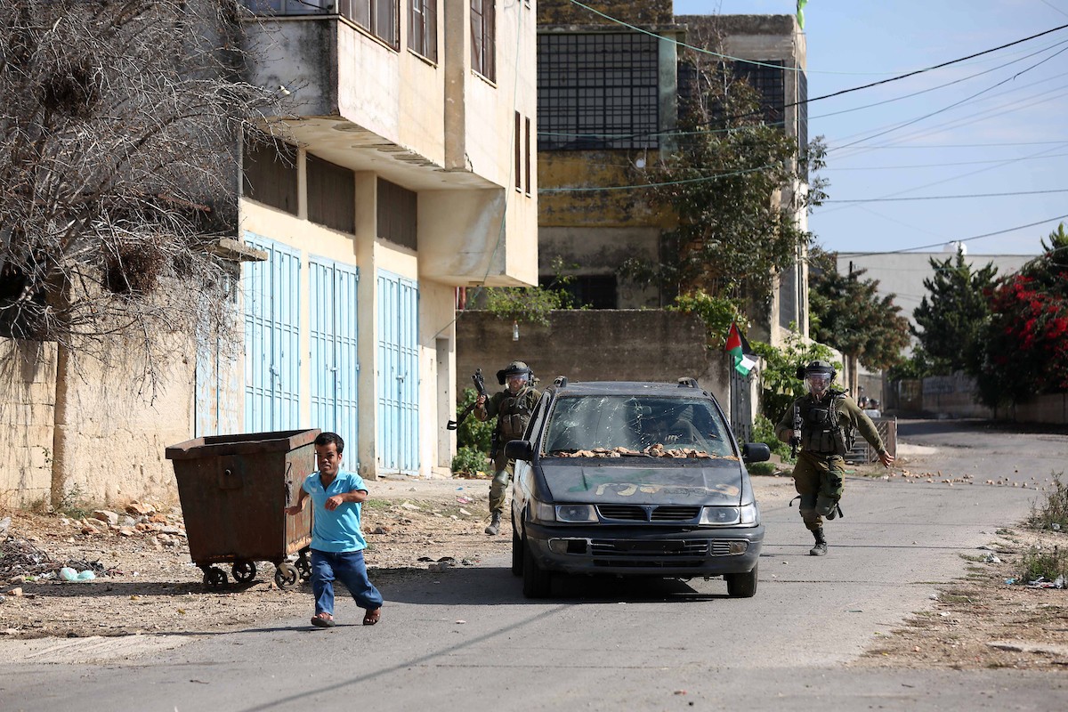 مواجهات بين المتظاهرين الفلسطينيين وجيش الاحتلال عقب المسيرة الأسبوعية المناهضة للاستيطان في كفر قدوم 4.jpg