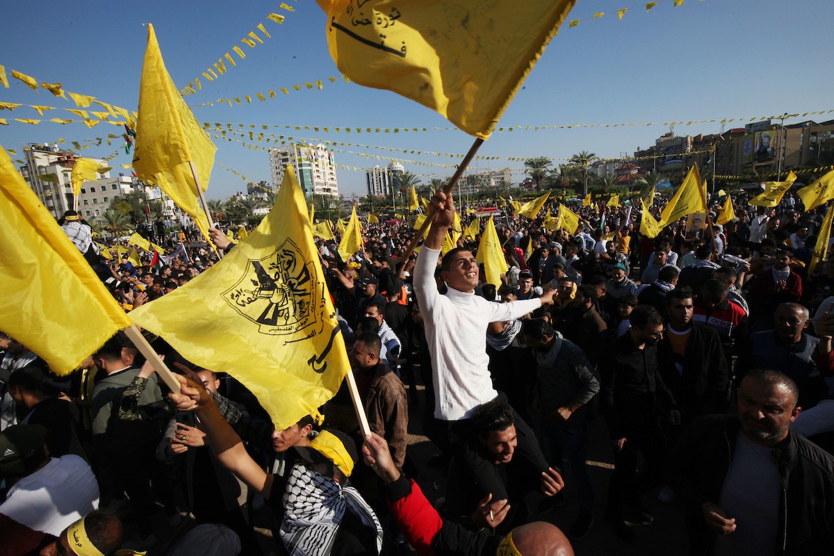 أنصار حركة فتح يشاركون في مهرجان مركزي في الذكرى الـ 18 لاستشهاد الرئيس الفلسطيني الراحل ياسر عرفات في غزة 2.jpg