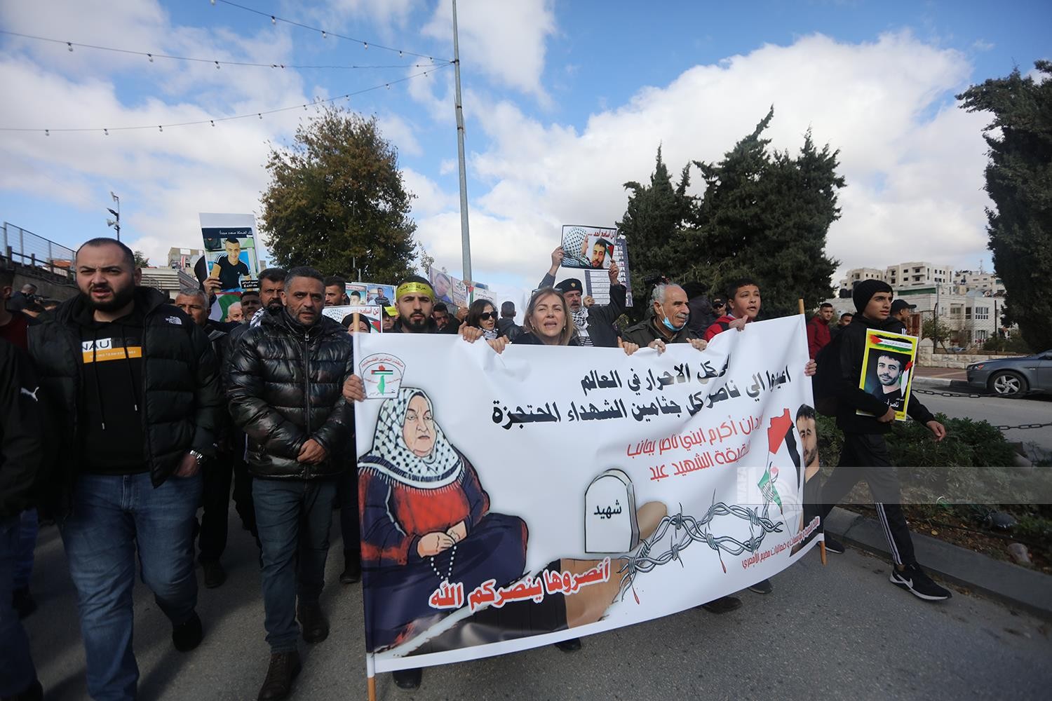 مسيرة ووقفة في مخيم الامعري للمطالبة باسترداد جثامين الشهداء المحتجزة 6.jpg
