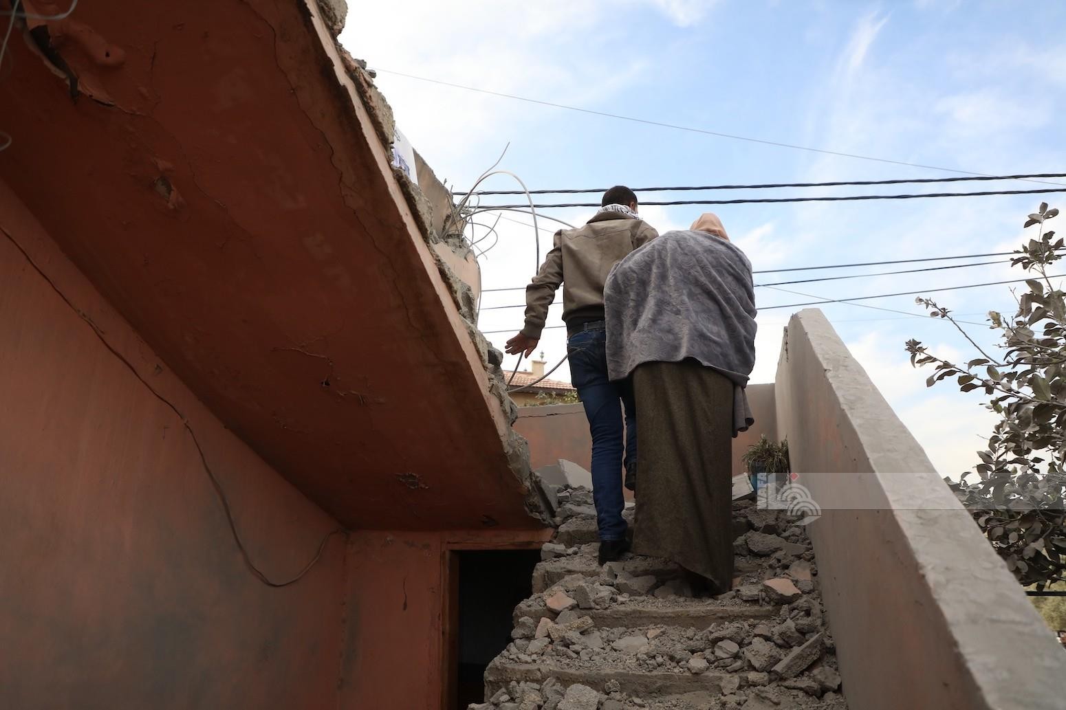 مواطنون يتفقدون ركام المنازل التي فجرها الاحتلال في بلدة كفر دان غرب جنين 7(1).jpg