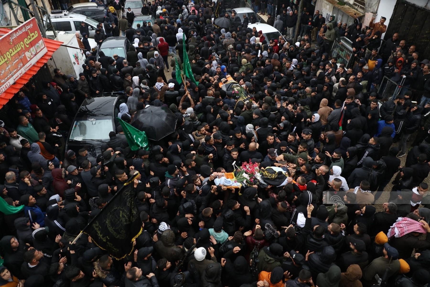 تشييع جثماني الشهيدين امجد خليلية ( 21 عام ) والشهيد عز الدين حمامرة (22 عام ) لمثواهم الاخير في بلدة جبع قرب جنين 3.jpg