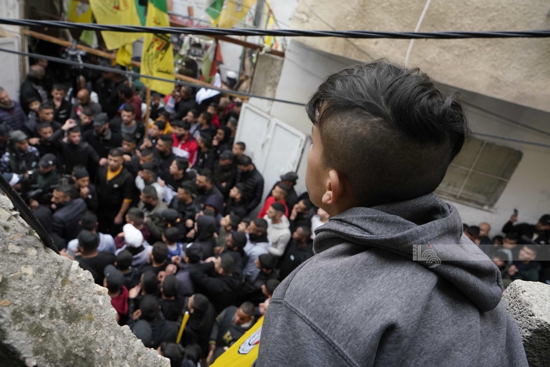 تشييع جثمان الشهيد عامر أبو زيتون ( 16 عاما) لمثواه الاخير في مخيم بلاطة شرق نابلس 1.jpg