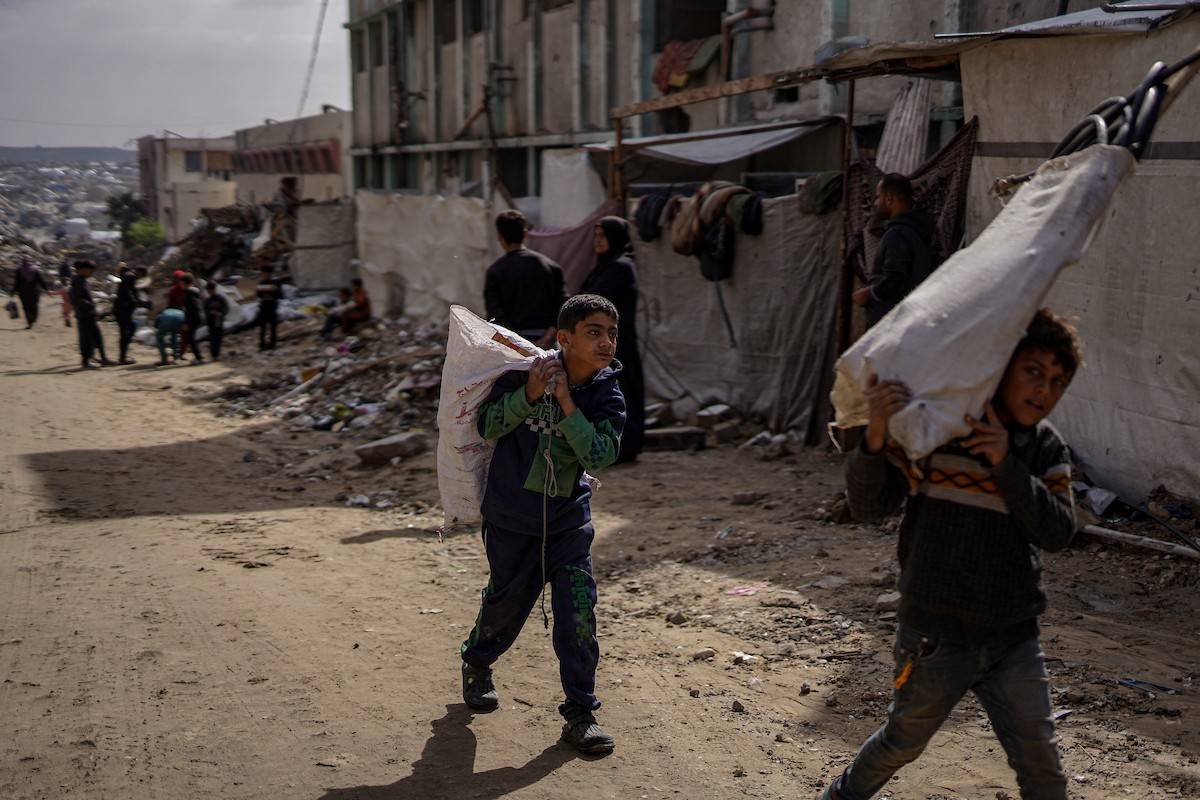 وفد من الأمم المتحدة يتفقد حوض تجميع مياه الصرف الصحي في حي الشيخ رضوان بمدينة غزة (30).jpg
