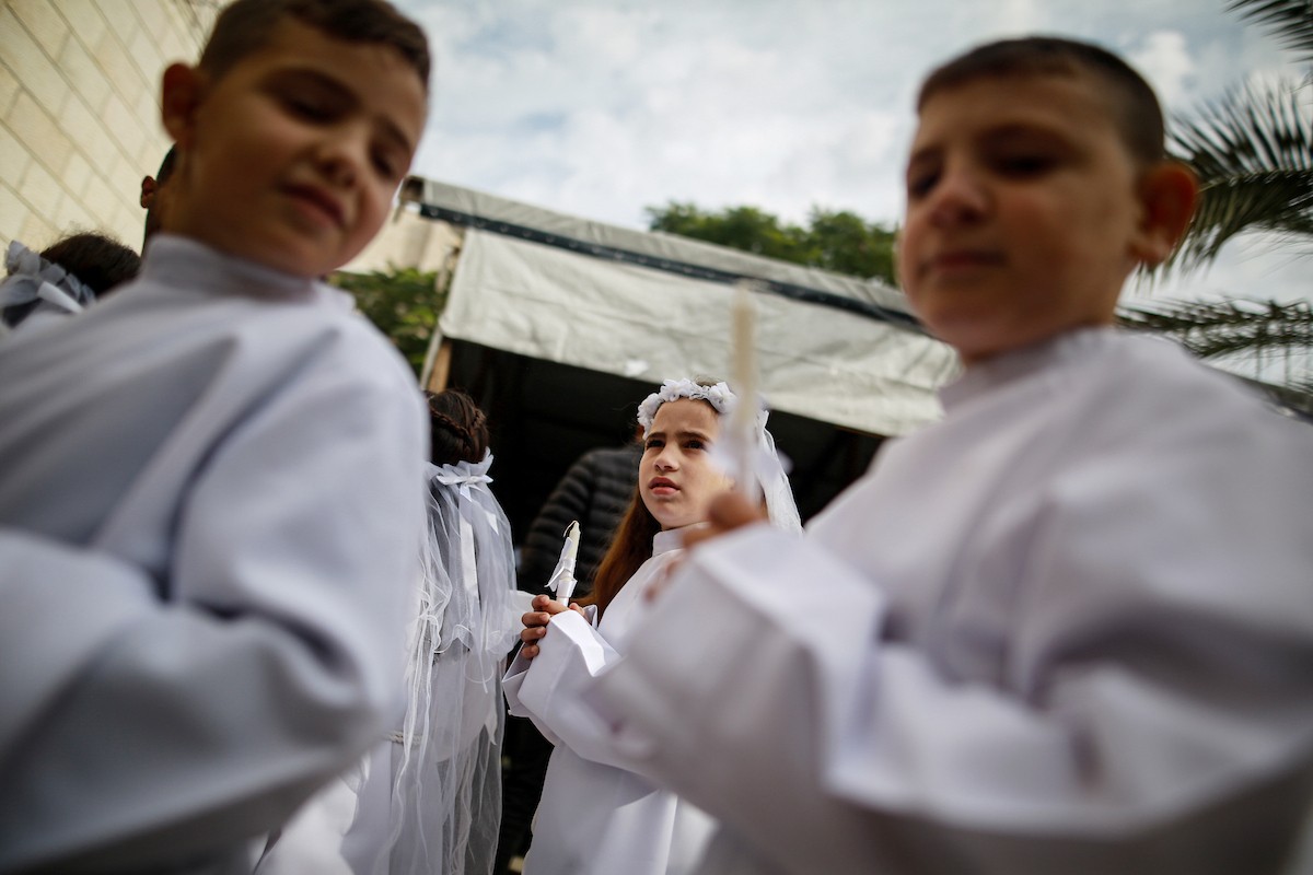 بطريرك اللاتين في القدس الكاردينال بييرباتيستا بيتسابالا يترأس قداس عيد الميلاد في غزة يوم الأحد 21 ديسمبر/كانون الأول 2025.تصوير: عمر أشتوي
