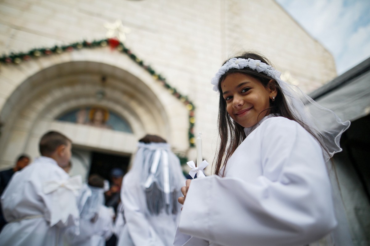 بطريرك اللاتين في القدس الكاردينال بييرباتيستا بيتسابالا يترأس قداس عيد الميلاد في غزة يوم الأحد 21 ديسمبر/كانون الأول 2025.تصوير: عمر أشتوي